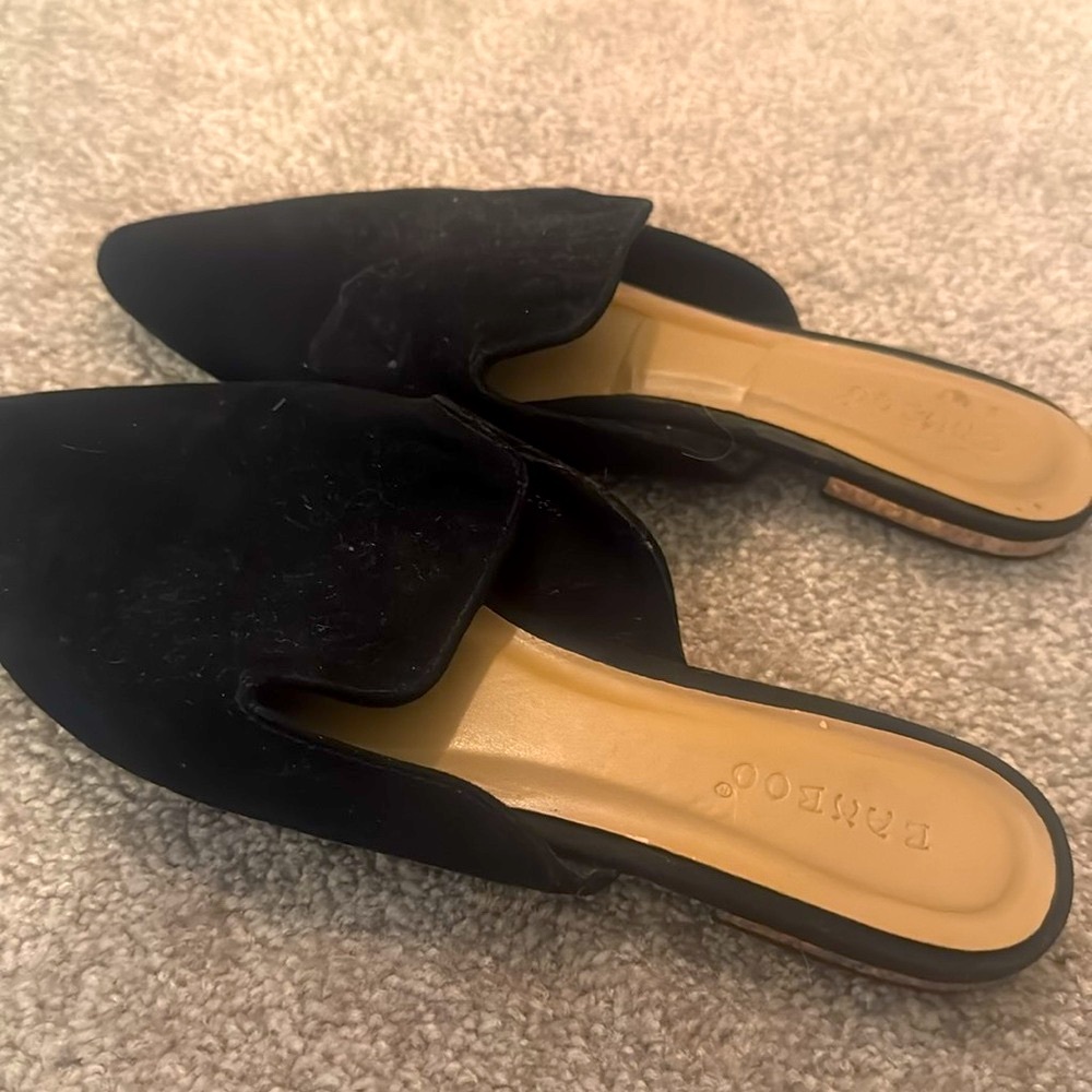 BAMBOO Black Suede Slides with gold trim at the heel